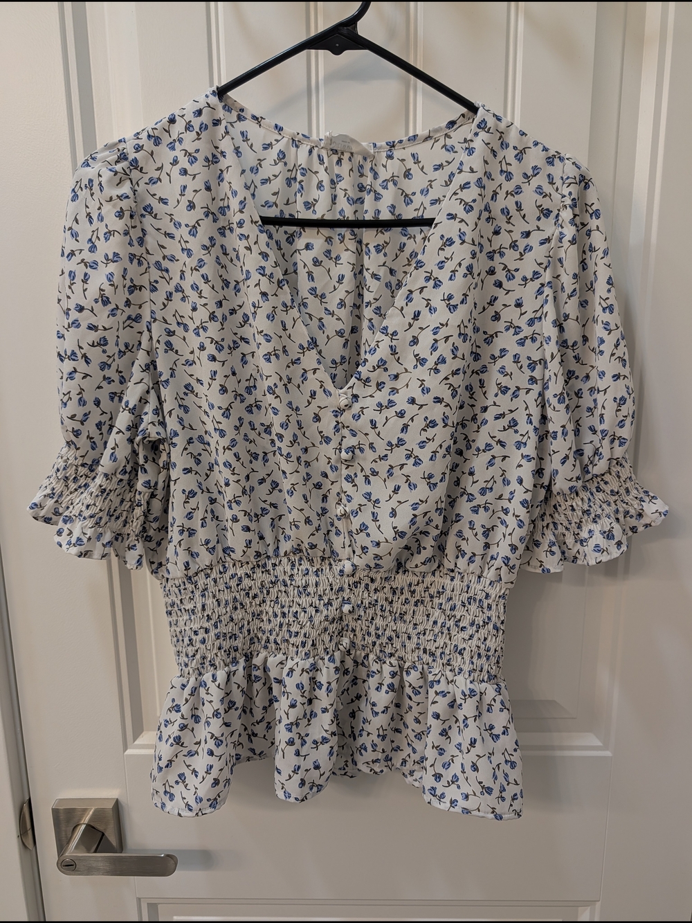 Sienna Sky White V-Neck Smocked Peplum Top with Blue Floral Print